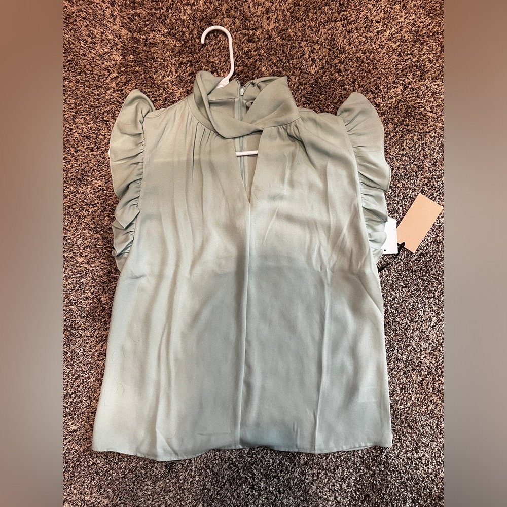 Halogen twist neck ruffle sleeveless top.